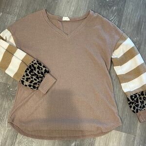 Woman’s long-sleeve waffle knit sweater